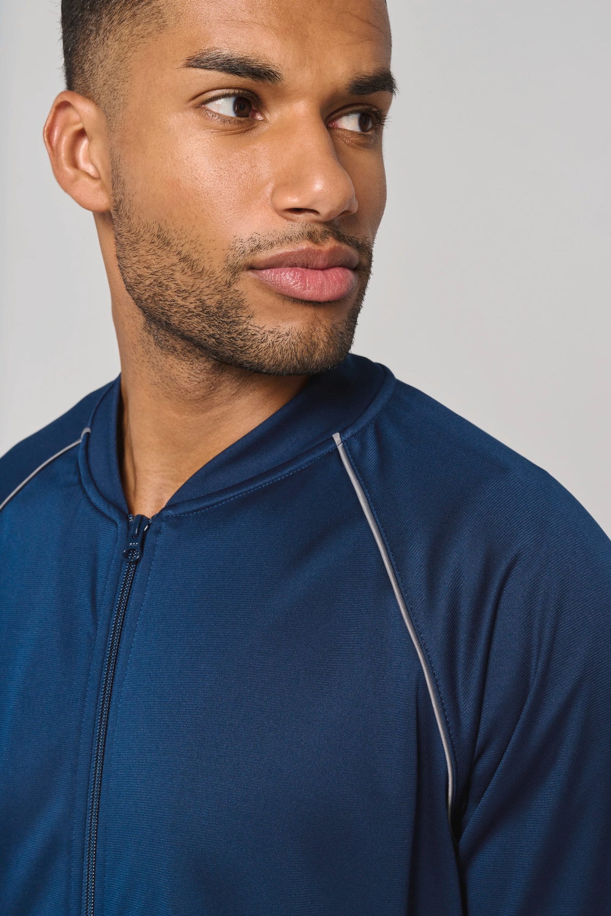 PROACT® PA384 unisex trainingsjasje met rits en biesje