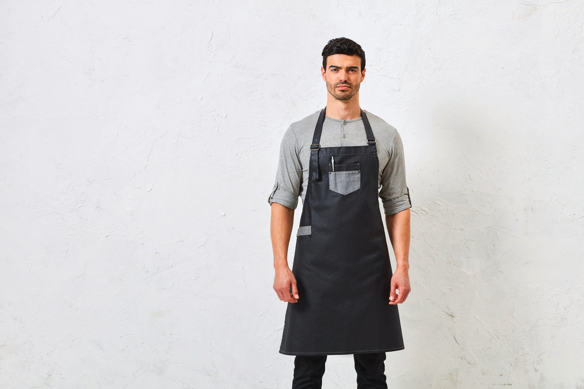 Premier PR136 Division - Waxed look denim bib apron with faux leather