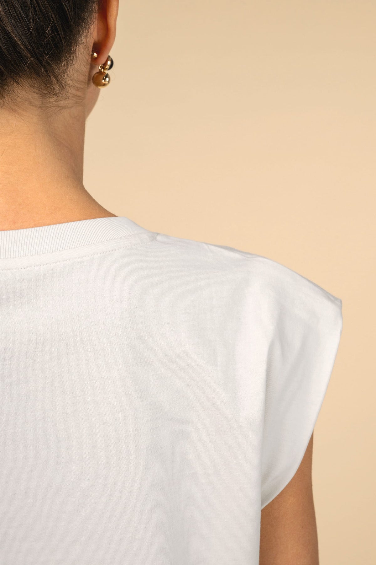 Spasso SP306 Dames-T-shirt van verantwoorde materialen zonder mouwen met schoudervullingen